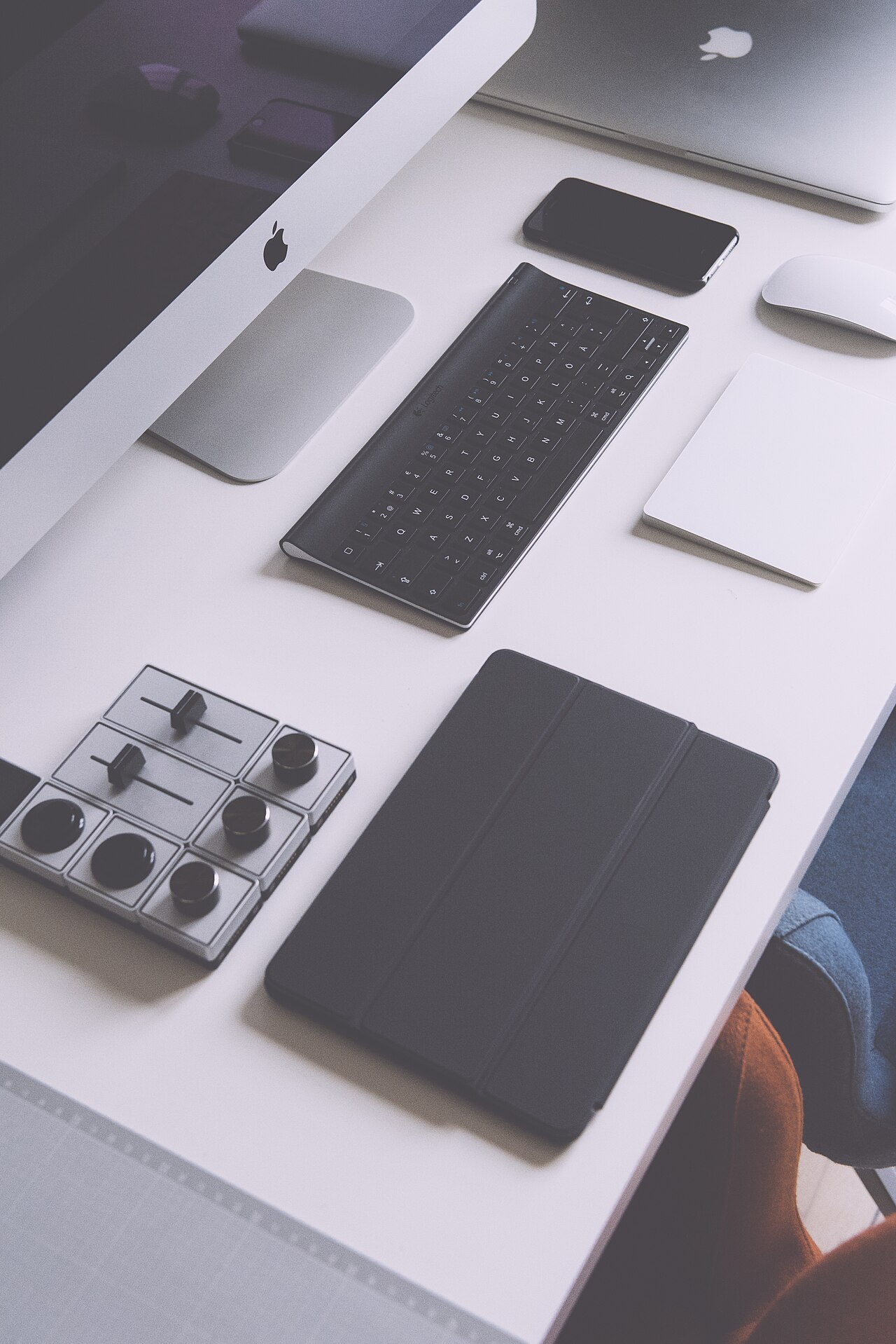 Devices and gadgets arranged on a desk